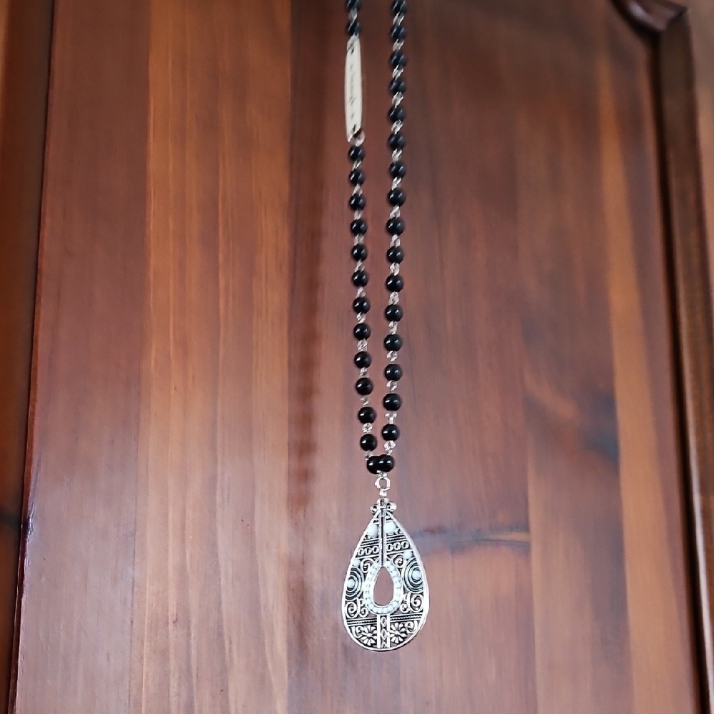 Silver and Black Beaded Pendant Necklace With Intricate Design